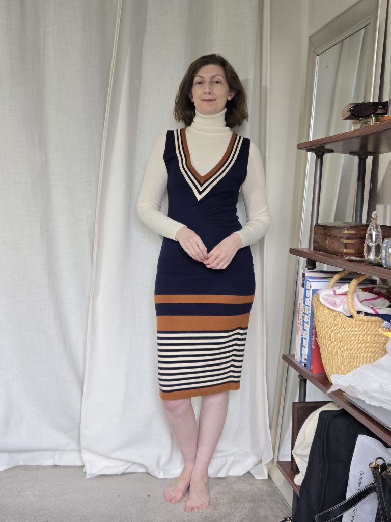 ivory turtleneck sweater under sweater dress