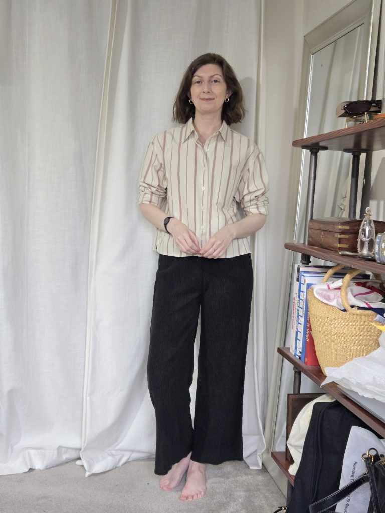 striped button down shirt with black textured pants